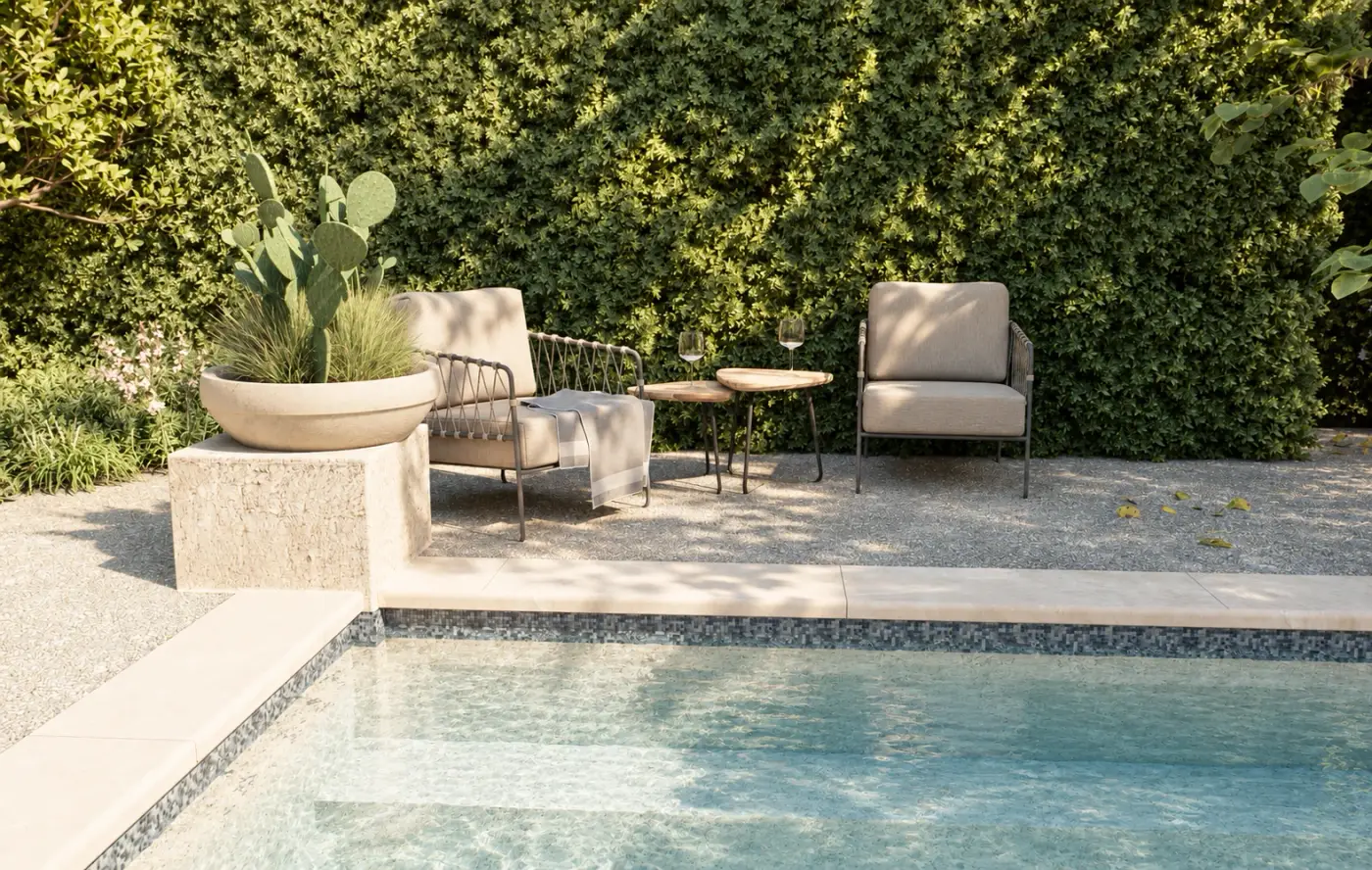 Rendering of a pool terrace with lounge chairs and a planted bowl against a hedge