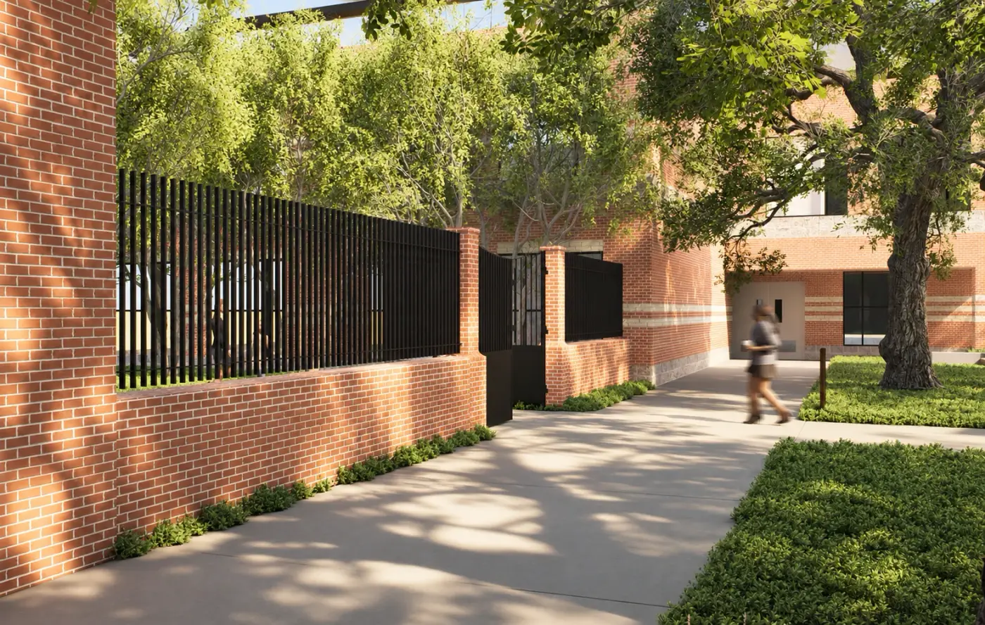 Rendering of a path beside a brick wall with a black metal fence