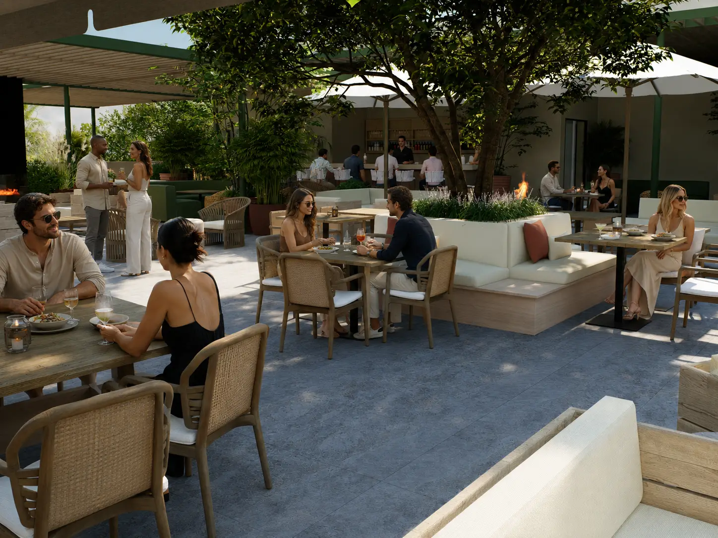 People dining on a shaded restaurant terrace